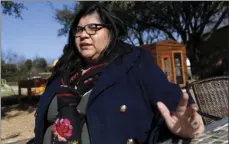  ?? PHOTO/TONY GUTIERREZ ?? Maria De Jesus Garza poses for a photo, Thursday, Jan. 18 in Dallas. In 2014, De Jesus Garza tried to file a complaint against an officer who ticketed her for having trash cans that obstructed traffic. AP