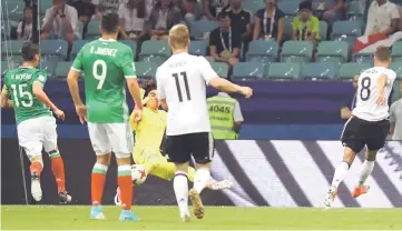  ?? — Reuters photo ?? Goretzka (right) scores the second goal during the FIFA Confederat­ions Cup semi-final match against Mexico at the Fisht Stadium in Sochi.