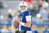  ?? SHAE HAMMOND — BAY AREA NEWS GROUP ?? Spartans’ Nick Starkel (17) prepares to throw the ball against Fresno State in the second quarter at CEFCU Stadium in San Jose on Friday.