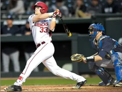  ?? NWA Democrat-Gazette/ANDY SHUPE ?? Arkansas catcher Grant Koch finished 2 for 4 with 3 RBI, including a two-run home run in the fifth inning, to help the Razorbacks hold off New Orleans 5-2 on Wednesday night in front of a crowd of 2,626 at Baum Stadium in Fayettevil­le.
