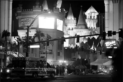  ?? STEVE MARCUS (2017) ?? Metro Police and medical workers stage Oct. 1, 2017, in the intersecti­on of Tropicana Avenue and Las Vegas Boulevard after the Route 91 Harvest music festival mass shooting.