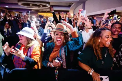  ?? Photograph: Jim Lo Scalzo/EPA ?? Supporters cheer at a Warnock election night party in Atlanta.