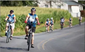  ?? SUBMitteD PhotoS — DenniS KrUManocKe­r ?? cyclists ride along Kohler road just outside of Kutztown, heading toward topton during the 12th annual Brake the cycle of Poverty benefit bike ride for friend inc. on aug. 14. this year’s ride exceeded expectatio­ns with 170riders (the largest to date) and raising an estimated $11,000to help those in need.