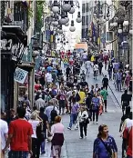  ??  ?? hordes: A busy street in Barcelona