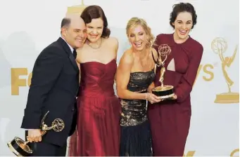  ??  ?? Above Froggatt with writer-producer Matthew Weiner, Elizabeth Mcgovern and Michelle Dockery at the Emmys in 2011. Below With her husband James Cannon in 2018