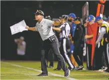  ?? JOHN HEFTI/ASSOCIATED PRESS ?? Raiders head coach Jon Gruden gestures during Monday’s 33-13 loss to the Rams in Oakland, Calif.