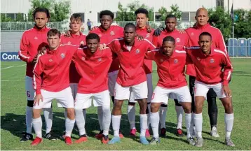  ??  ?? Sint Maarten…the team line up ahead of their clash with the Turks & Caicos Islands
