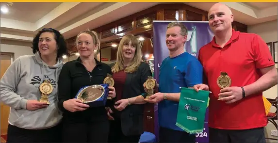  ??  ?? The Stackallen team who won the Class 8 and 9 section of the North East Leinster League, (l to r) Louise McWeeney, Gwen Connolly, Frankie Crinion and Richard Mullen, receive their prizes from Nikki Coffey of Leinster Tennis (centre). The Class 9 and 10 finalists, also from Stackallen, were Ger Roche Garland, Padraig Byrne, Thomas Bannon and Eimear Priesler.