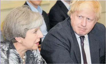  ??  ?? WAR OF WORDS: PM Theresa May and Boris Johnson are at loggerhead­s over Brexit