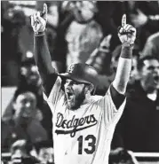  ?? KEVORK DJANSEZIAN/GETTY ?? Max Muncy celebrates as he rounds the bases after hitting a walk-off homer in the 18th inning of Game 3.