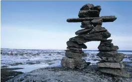  ?? HEIKO WITTENBORN ?? An Inukshuk overlooks the village of Kuujjuaq. Sick children in such northern Quebec communitie­s are often airlifted to Montreal without any family members.