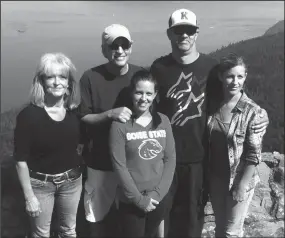  ?? TRIBUNE NEWS SERVICE ?? Retired principal Chuck Watson (second from left) at Orcas Island with wife Dawn and their three children, Courtney, Trevor and Stefanie.