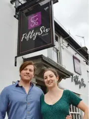  ??  ?? GLAD TO BE BACK: Andy Rogers and Emily Stevenson are happy to welcome visitors back to Bar 56 and The Redan