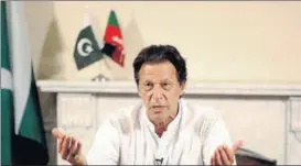  ?? AP ?? Imran Khan declares victory for his party in the country's general elections on Thursday.