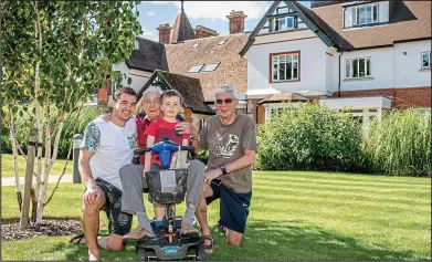  ??  ?? Fun for all: Clive Jecks (right), his dad Roy, 96, and family at Charters Village in East Grinstead