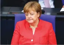  ?? - Reuters file photo ?? STANDING DIMINISHED: German Chancellor Angela Merkel stunned observers in October with the announceme­nt she would not stand again as chairwoman of her centre-right Christian Democrats (CDU).