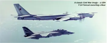  ?? ?? A classic Cold War image – a USN F-14 Tomcat escorting a Bear