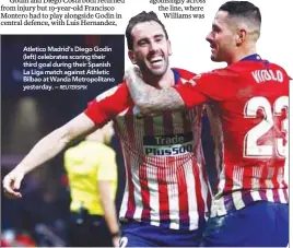  ?? REUTERSPIX ?? Atletico Madrid’s Diego Godin (left) celebrates scoring their third goal during their Spanish La Liga match against Athletic Bilbao at Wanda Metropolit­ano yesterday. –