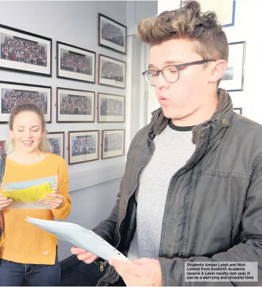  ??  ?? Students Amber Leigh and Nick Linfoot from Gosforth Academy receive A Level results last year. It can be a worrying and stressful time