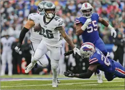  ?? JOHN MUNSON – THE ASSOCIATED PRESS ?? Philadelph­ia’s Miles Sanders ran for a touchdown and led the Eagles to 218rushing yards in Sunday’s 31-13victory over Buffalo at Orchard Park, N.Y.