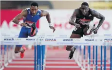  ?? DANIEL COLE/POOL/AFP VIA GETTY IMAGES ?? Chesapeake native Grant Holloway, right, finished fourth at a meet in Monaco in August in 13.19 seconds. Spain’s Orlando Ortega, left, won it in 13.11.