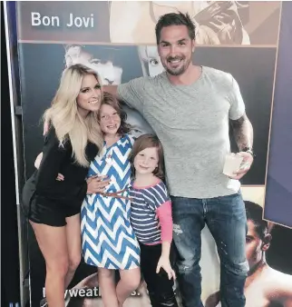  ?? COURTESY SHELDON SOURAY ?? Sheldon Souray, who played 758 games from 1997-2013 with New Jersey, Montreal, Edmonton, Dallas and Anaheim, with his fiancé Barbie Blank and his daughters Valentina, left, and Scarlett.