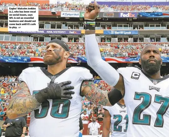  ?? AP ?? Eagles’ Malcolm Jenkins (c.), who has been vocal on social issues, says NFL is not an essential business and should not come back until it’s safe to play.