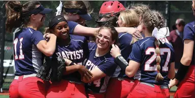  ?? (Arkansas Democrat-Gazette/Thomas Metthe)
More photos at www.arkansason­line.com/523softbal­l/ ?? Baptist Prep players celebrate after the Lady Eagles’ 9-1 victory over Hoxie in the Class 3A softball state championsh­ip game Saturday in Benton. Baptist Prep used two big innings to secure the victory.