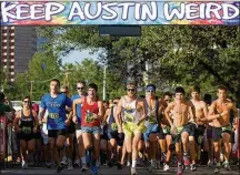  ?? ZACH ORNITZ / AMERICANST­ATESMAN 2011 ?? Runners in the Keep Austin Weird 5K race in June 2011 bolt off the starting line. The phrase “Keep Austin Weird” has been owned as a trademark since 2001 by Outhouse Designs of Austin.