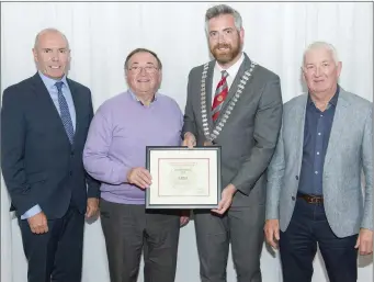 ??  ?? Cork County Council chief executive Tim Lucey and County Mayor Cllr Christophe­r O’Sullivan with Dan Dennehy and Derry Morley from Cullen, which won the overall ‘Best Improved Village’ award.