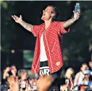  ??  ?? Justin Bieber performing in Hyde Park. A 50,000-strong crowd was happy just to hear the Canadian megastar’s songs played loud and in his presence