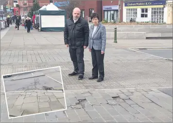  ??  ?? Councillor­s Darren Price and Charlotte Atkins inspect the site and, inset, some road damage.