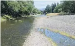  ??  ?? Contrast . . . These photograph­s at the lower Manuheriki­a River near the Alexandra campground flow recorder show the difference in summer flows .