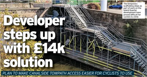  ??  ?? The temporary scaffoldin­g steps as part of work on the Island Quarter developmen­t have proved difficult for cyclists to climb