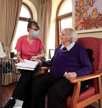  ??  ?? TAKING CARE: Resident Maisie Sheridan with her carer Amy Ellis