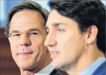  ?? CP PHOTO ?? Mark Rutte, left, Prime Minister of the Netherland­s, and Prime Minister Justin Trudeau hold a joint press conference on Parliament Hill in Ottawa on Thursday.