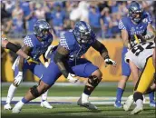  ?? PHELAN M. EBENHACK – THE ASSOCIATED PRESS ?? Darian Kinnard, center, an All-american at Kentucky, is an offensive lineman the Rams could target in the draft.