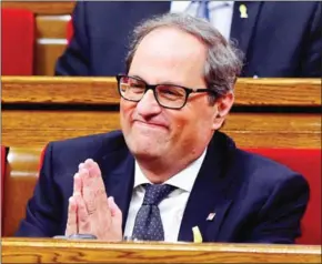  ?? LLUIS GENE/AFP ?? Quim Torra was appointed regional president on Monday, vowing to keep fighting for an independen­t Catalan republic.