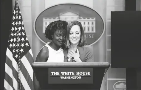  ?? EVAN VUCCI/AP ?? White House press secretary Jen Psaki hugs incoming press secretary Karine Jean-Pierre during a press briefing at the White House on Thursday in Washington.