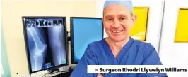  ??  ?? > Surgeon Rhodri Llywelyn Williams