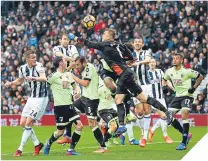  ??  ?? ■ Goalkeeper Artur Boruc attempts a punch.