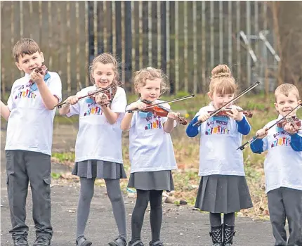  ?? Picture: Steven Brown. ?? Playing violins with cellist Jenni Harra, Caitlyn Bertie, Ryan MacKenzie, Amelia Souter, Claypotts, and Josie Mitchell, Peter Diamond, Maggie McGraw, St Pius.