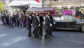  ??  ?? Pallbearer­s carry the casket of pioneering Black actor Cicely Tyson from Harlem’s famed Abyssinian Baptist Church to a hearse on Tuesday.