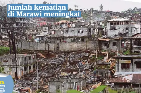  ??  ?? GAMBAR menunjukka­n kemusnahan di bandar Marawi selepas pertempura­n meletus sejak 62 hari lalu. - AFP