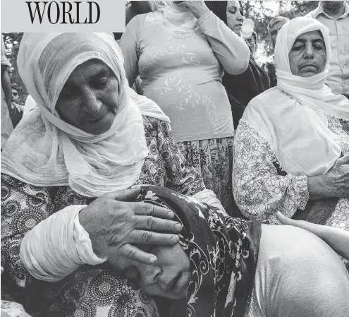  ?? ILYAS AKENGIN / AFP / GETTY IMAGES ?? The suicide bomb targeted Gaziantep’s predominan­tly Kurdish Akdere neighbourh­ood, where wedding guests had been dancing in the street.