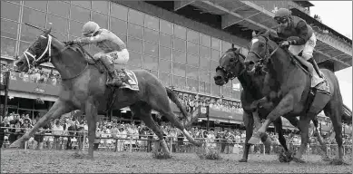  ?? BARBARA D. LIVINGSTON ?? Whitmore (left) and A. P. Indian (far right) finish first and second in the Maryland Sprint.