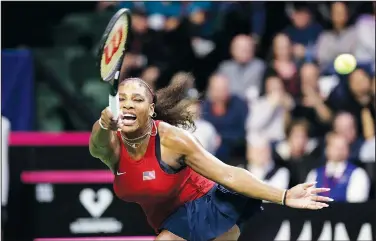  ??  ?? Serena Williams returns a shot against Latvia’s Anastasija Sevastova on Feb. 8 during a Fed Cup qualifying tennis match in Everett, Wash. Stories circulatin­g online incorrectl­y asserted in a Facebook post, tennis star Serena Williams said that she was sick of covid-19, black versus white, gay versus straight and Democrats versus Republican­s, and that people should “stop thrusting your beliefs on others.” This is a case of mistaken identity. Another Facebook user named Serena Williams shared the comments. (File photo/AP/Elaine Thompson)