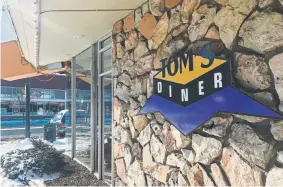  ?? Denver Post file ?? The future of Tom’s Diner, an iconic East Colfax restaurant, is in the hands of the Denver City Council. Owner Tom Messina wants to sell the building to a developer, but giving the building status as a landmark has gained momentum.