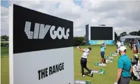  ?? Photograph: Adrian Dennis/AFP/Getty Images ?? Players practice on the driving range ahead of the first LIV event at the Centurion Club in Hertfordsh­ire in June 2022.