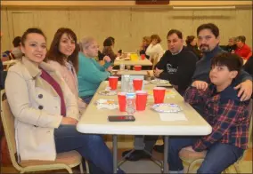  ?? LAUREN HALLIGAN - MEDIANEWS GROUP ?? A team called The Winners prepares for the Scrabble Challenge.